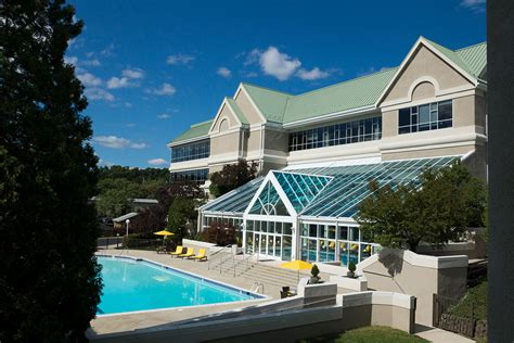 Enjoy a romantic weekend getaway in the Poconos with spacious luxury suites fitted with log burning fireplaces, whirlpool tubs & more at Cove Pocono Resorts. . Kosher hotel poconos